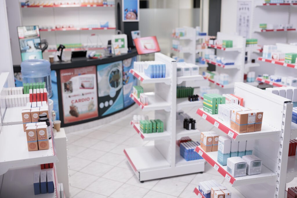 Custom endcap display in a pharmacy showcasing skincare and wellness products