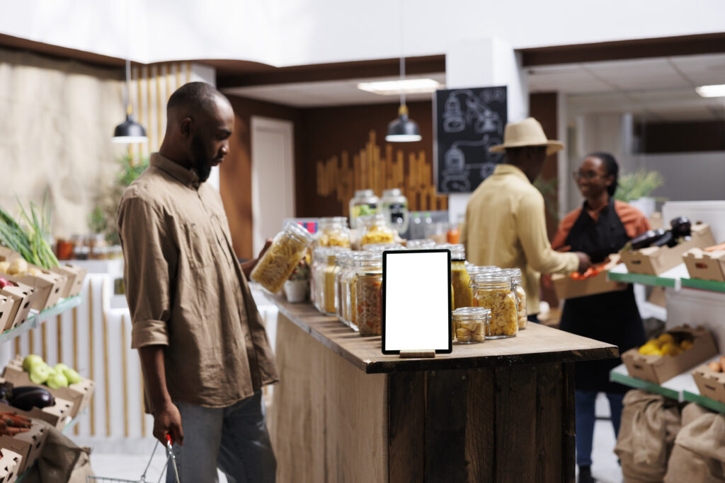 Tablet with white screen in a food store