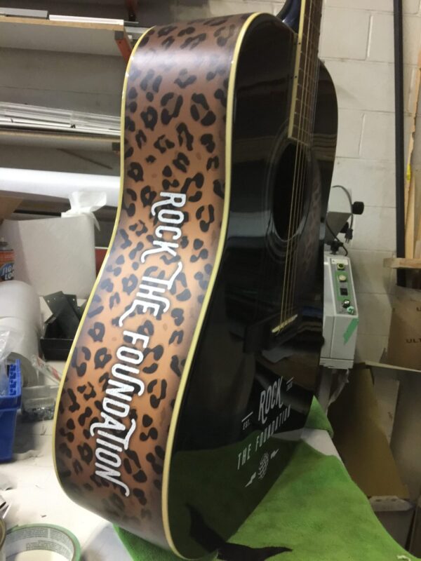 Wrapped Acoustic Guitar – Branded Presentation and Performance