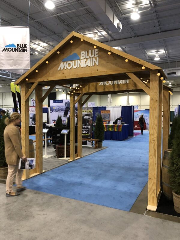 Premium Trade Show Booth – Custom Wood Awning and Branding